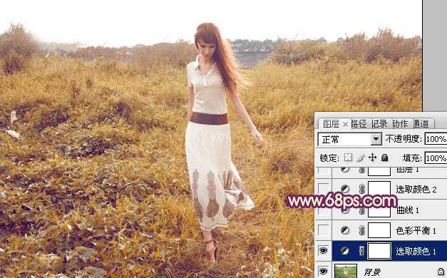 ‘Photoshop将草地人物图片调制出秋季漂亮的橙色效果‘