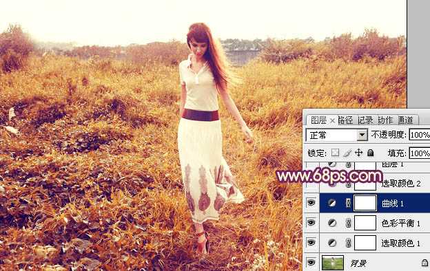 ‘Photoshop将草地人物图片调制出秋季漂亮的橙色效果‘