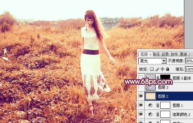 ‘Photoshop将草地人物图片调制出秋季漂亮的橙色效果‘