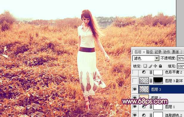 ‘Photoshop将草地人物图片调制出秋季漂亮的橙色效果‘