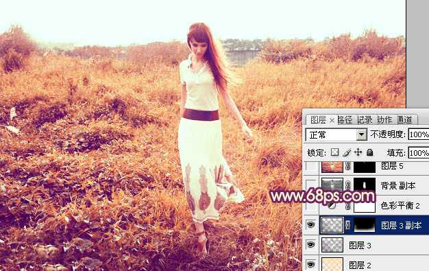 ‘Photoshop将草地人物图片调制出秋季漂亮的橙色效果‘