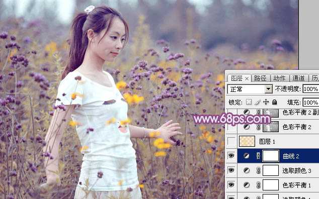 ‘Photoshop为站在野花从中的美女调制出柔美的淡紫色‘