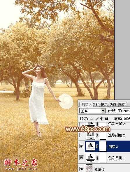 ‘Photoshop将草地树林人物图片打造唯美的秋季淡黄色‘