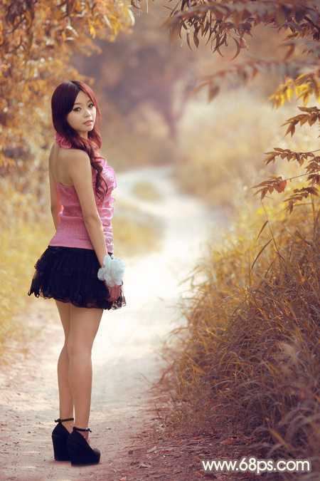 ‘Photoshop调制出漂亮的红褐色树林人物图片‘