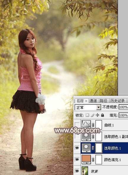 ‘Photoshop调制出漂亮的红褐色树林人物图片‘