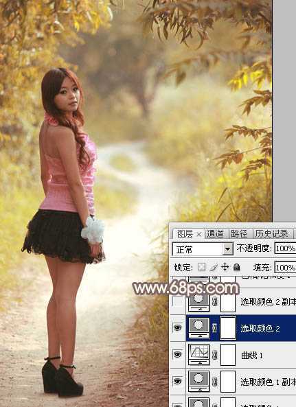 ‘Photoshop调制出漂亮的红褐色树林人物图片‘