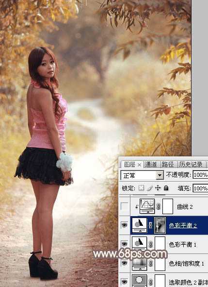 ‘Photoshop调制出漂亮的红褐色树林人物图片‘
