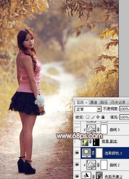 ‘Photoshop调制出漂亮的红褐色树林人物图片‘