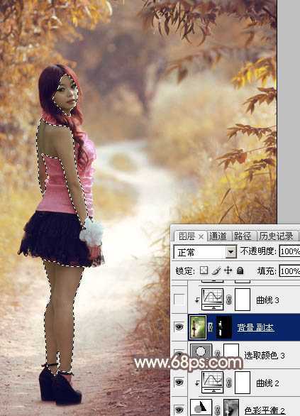 ‘Photoshop调制出漂亮的红褐色树林人物图片‘