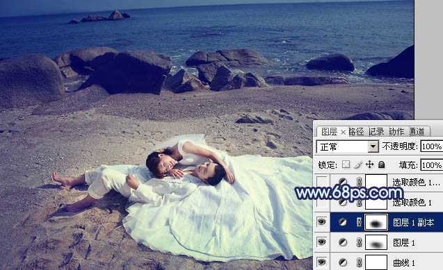 ‘Photoshop将沙滩婚片打造出经典暗蓝色效果‘