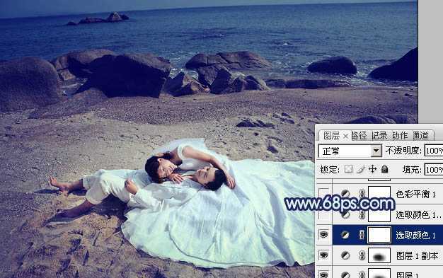 ‘Photoshop将沙滩婚片打造出经典暗蓝色效果‘