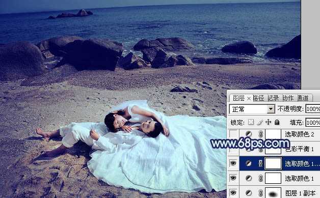 ‘Photoshop将沙滩婚片打造出经典暗蓝色效果‘