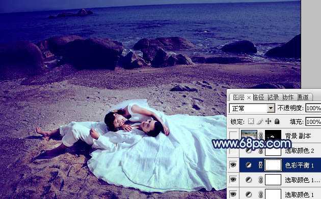 ‘Photoshop将沙滩婚片打造出经典暗蓝色效果‘