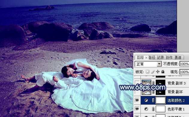 ‘Photoshop将沙滩婚片打造出经典暗蓝色效果‘