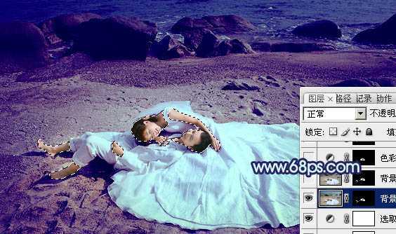 ‘Photoshop将沙滩婚片打造出经典暗蓝色效果‘