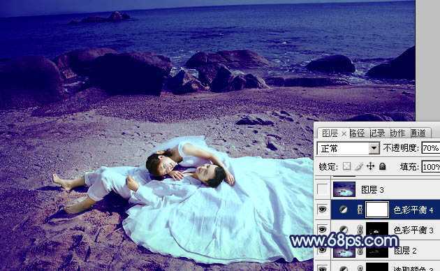 ‘Photoshop将沙滩婚片打造出经典暗蓝色效果‘