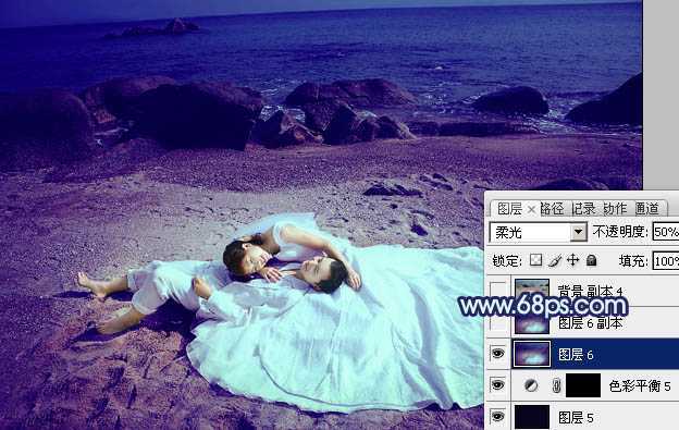 ‘Photoshop将沙滩婚片打造出经典暗蓝色效果‘
