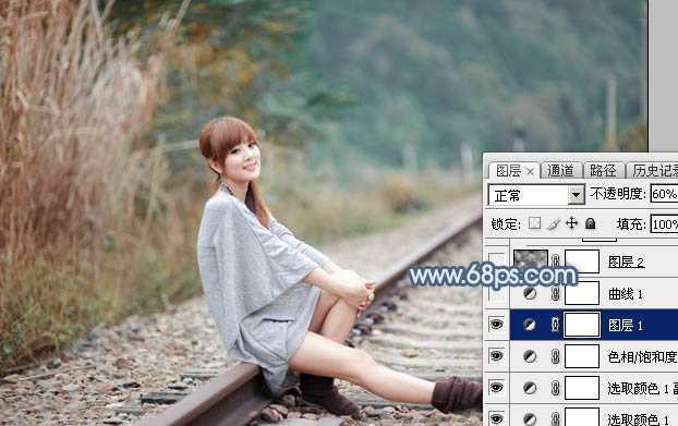 ‘Photoshop为铁轨上的美女调制出梦幻的淡蓝色‘