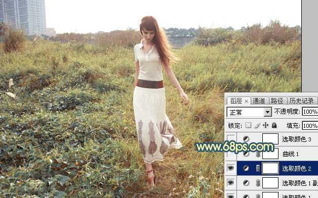 ‘Photoshop调出大气的暗调晨曦色荒草人物图片‘