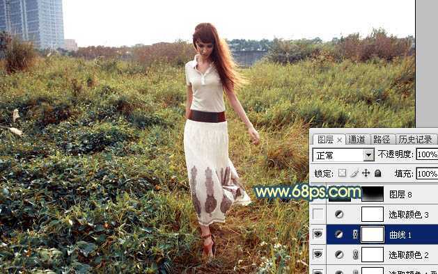 ‘Photoshop调出大气的暗调晨曦色荒草人物图片‘