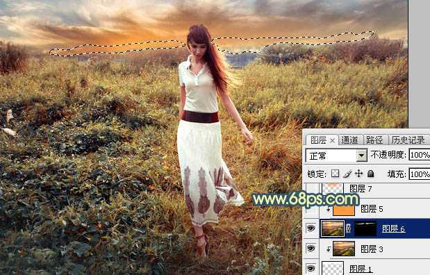 ‘Photoshop调出大气的暗调晨曦色荒草人物图片‘