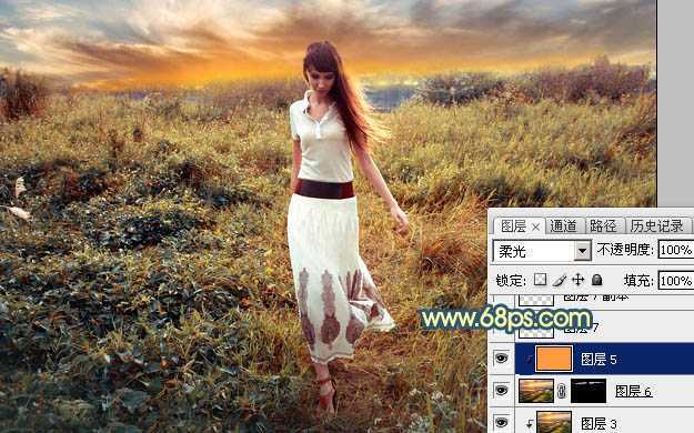 ‘Photoshop调出大气的暗调晨曦色荒草人物图片‘