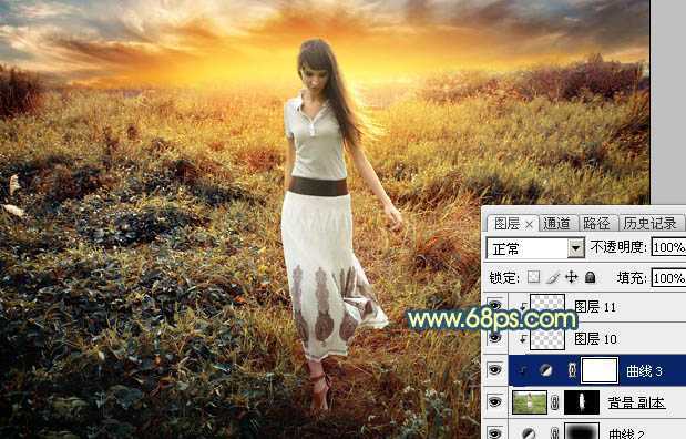 ‘Photoshop调出大气的暗调晨曦色荒草人物图片‘