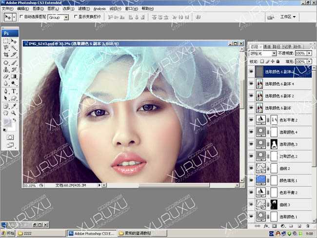‘Photoshop将美女图片调出非常干净的淡蓝色‘