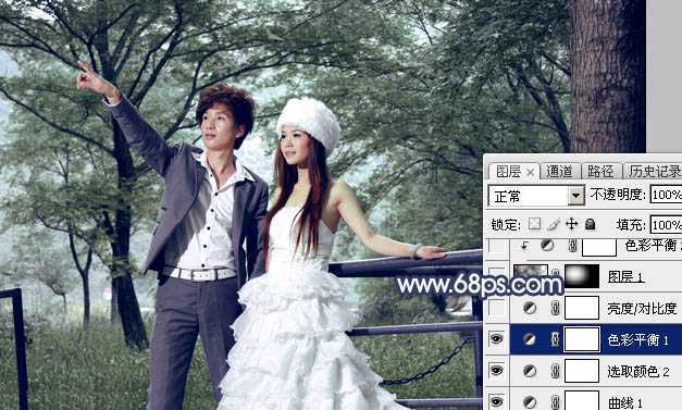 ‘Photoshop为树林婚片打造梦幻的暗青色‘