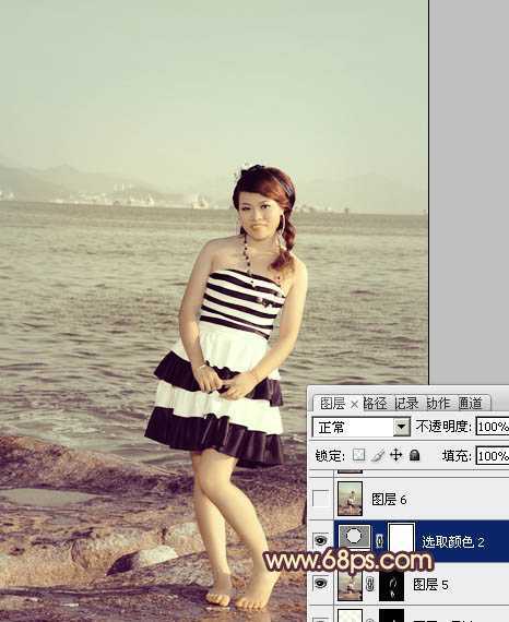 ‘Photoshop将海景人物图片打造非常柔美的淡褐色‘