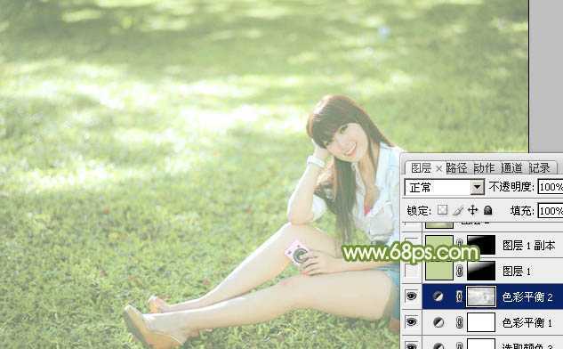 ‘Photoshop将绿草上的美女打造出甜美的韩系淡绿色‘