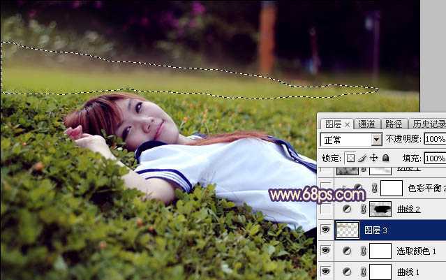 ‘Photoshop为躺在草地人物图片打造唯美梦幻的暗褐色‘