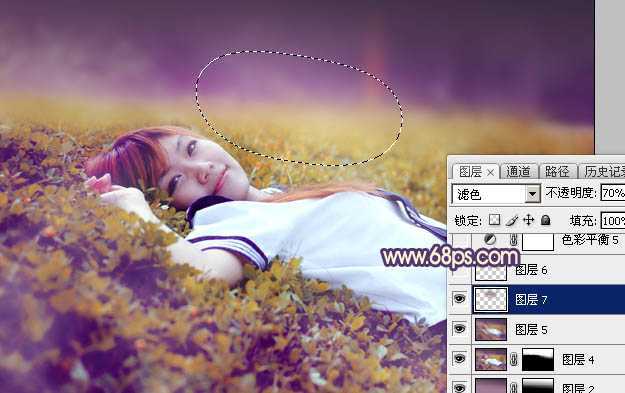 ‘Photoshop为躺在草地人物图片打造唯美梦幻的暗褐色‘