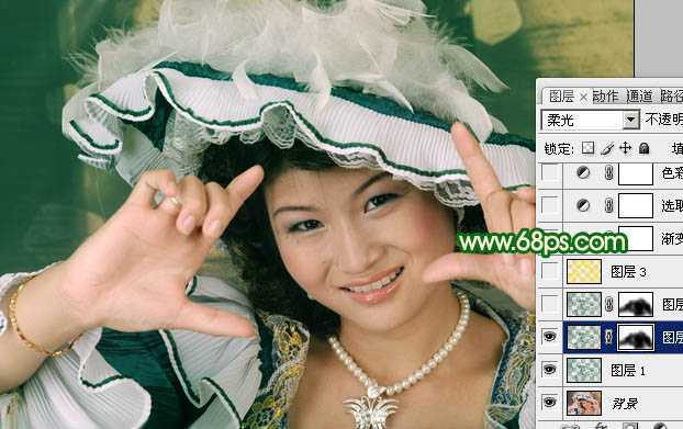 ‘Photoshop调出人物图片光亮的黄绿色‘