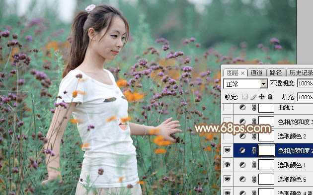 ‘Photoshop为花丛中的美女加上甜美的淡粉色‘