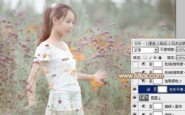 ‘Photoshop为花丛中的美女加上甜美的淡粉色‘