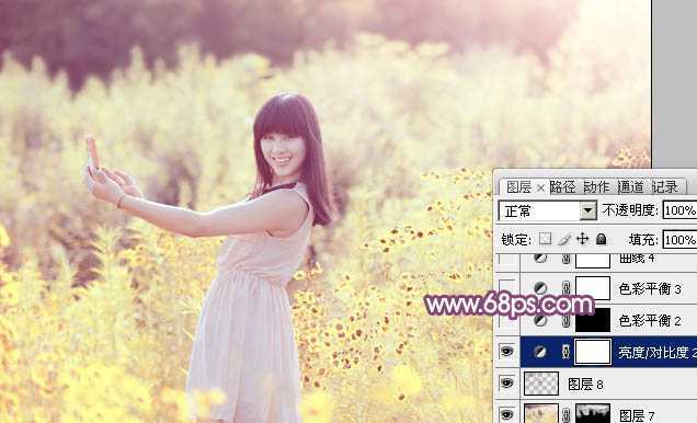 ‘Photoshop将偏暗野花中的美女图片调制出纯美的淡黄色‘