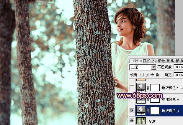 ‘Photoshop为树林人物图片调制出灿烂的青黄阳光色效果‘