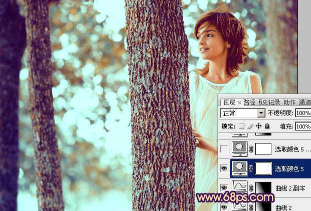 ‘Photoshop为树林人物图片调制出灿烂的青黄阳光色效果‘