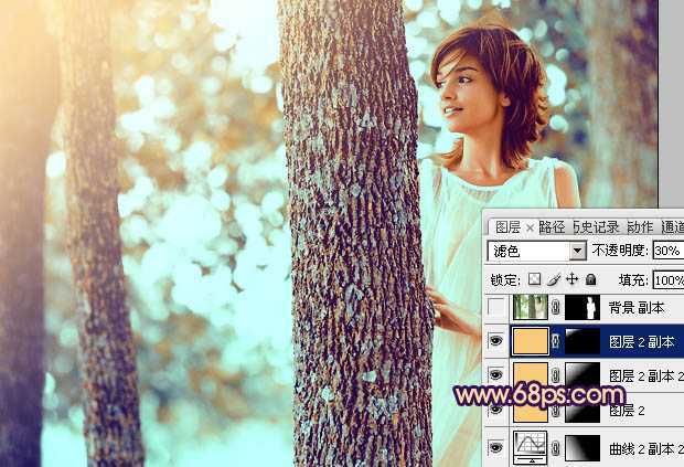‘Photoshop为树林人物图片调制出灿烂的青黄阳光色效果‘