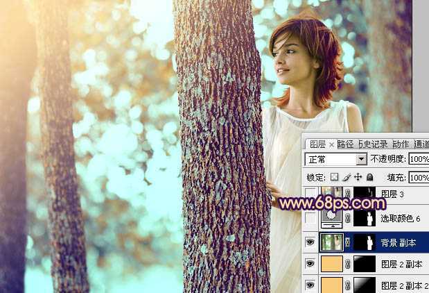 ‘Photoshop为树林人物图片调制出灿烂的青黄阳光色效果‘