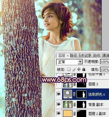 ‘Photoshop为树林人物图片调制出灿烂的青黄阳光色效果‘