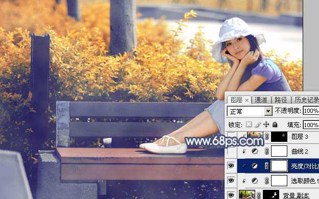 ‘Photoshop将秋季外景美女图片打造出清新的橙红色‘