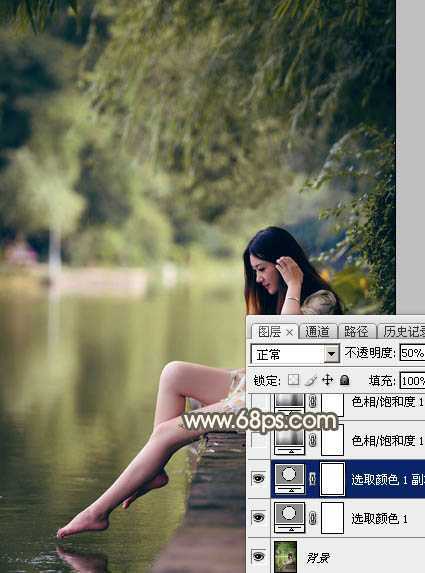 ‘Photoshop为水边的美女图片加上暗调金秋色‘