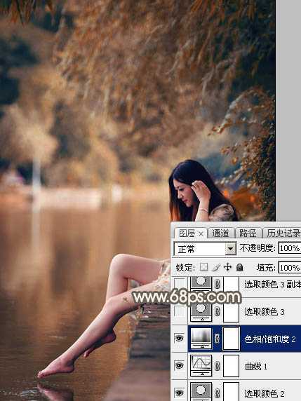 ‘Photoshop为水边的美女图片加上暗调金秋色‘