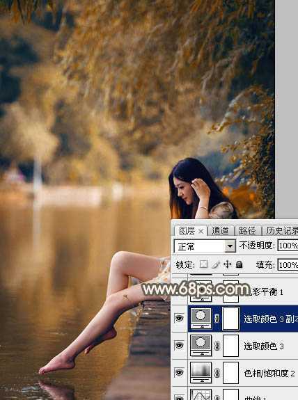 ‘Photoshop为水边的美女图片加上暗调金秋色‘