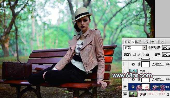 ‘Photoshop为树林人物图片加上强对比的青褐色效果教程‘