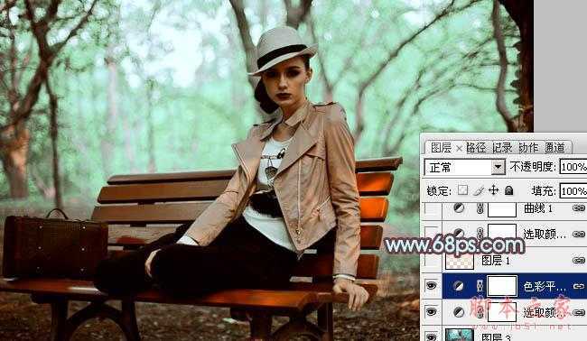 ‘Photoshop为树林人物图片加上强对比的青褐色效果教程‘