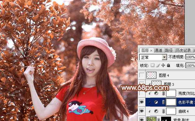 ‘Photoshop打造唯美的橙红色树林人物图片‘