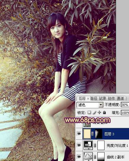 ‘Photosho将给树荫下的美女图片增加上漂亮的橙褐色效果‘